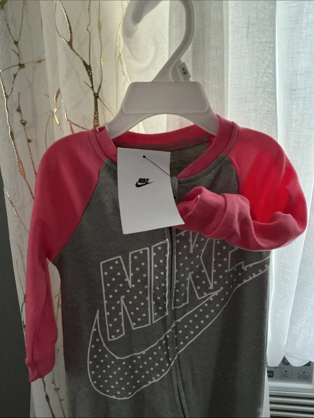 Nike Grey One-Piece Bodysuit with Pink Sleeves